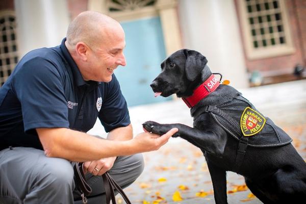 HUPD Officer Fumicello and Community Engagement Dog Sasha